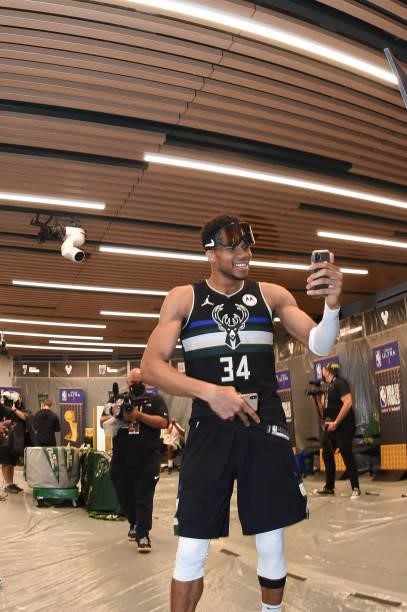 Giannis Antetokounmpo of the Milwaukee Bucks smiles after defeating the Phoenix Suns in Game Six to win the 2021 NBA Finals on July 20, 2021 at the...