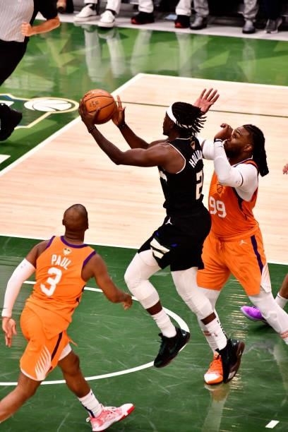 Jrue Holiday of the Milwaukee Bucks drives to the basket against the Phoenix Suns during Game Six of the 2021 NBA Finals on July 20, 2021 at the...