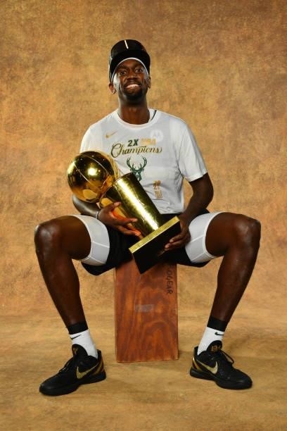 Bobby Portis of the Milwaukee Bucks poses for a portrait with the Larry O'Brien Trophy after winning Game Six of the 2021 NBA Finals against the...