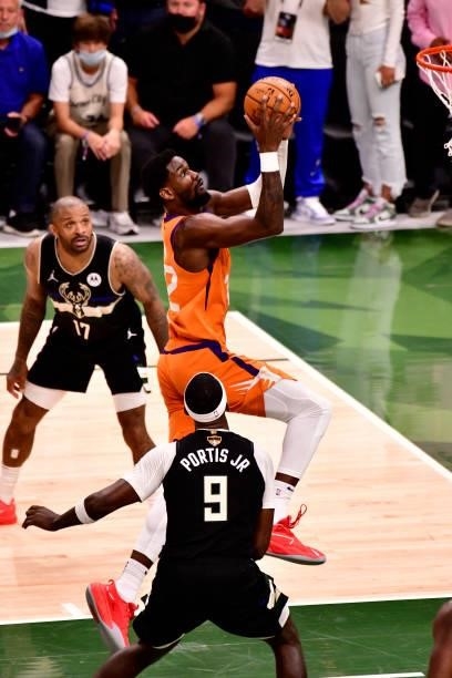 Deandre Ayton of the Phoenix Suns drives to the basket against the Milwaukee Bucks during Game Six of the 2021 NBA Finals on July 20, 2021 at the...