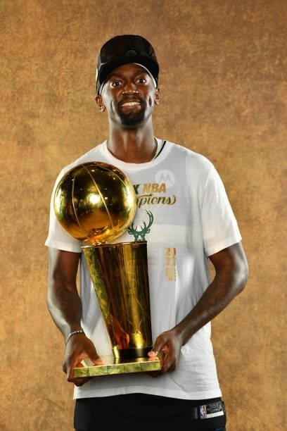 Bobby Portis of the Milwaukee Bucks poses for a portrait with the Larry O'Brien Trophy after winning Game Six of the 2021 NBA Finals against the...