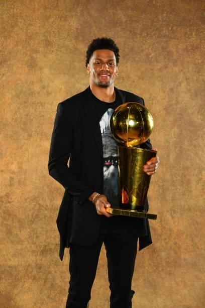 Axel Toupane of the Milwaukee Bucks poses for a portrait with the Larry O'Brien Trophy after winning Game Six of the 2021 NBA Finals against the...