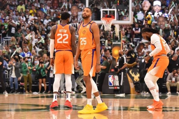 Mikal Bridges of the Phoenix Suns looks on during Game Six of the 2021 NBA Finals on July 20, 2021 at Fiserv Forum in Milwaukee, Wisconsin. NOTE TO...