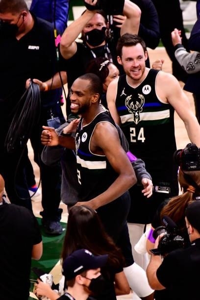 Khris Middleton and Pat Connaughton of the Milwaukee Bucks celebrate after winning Game Six of the 2021 NBA Finals against the Phoenix Suns on July...
