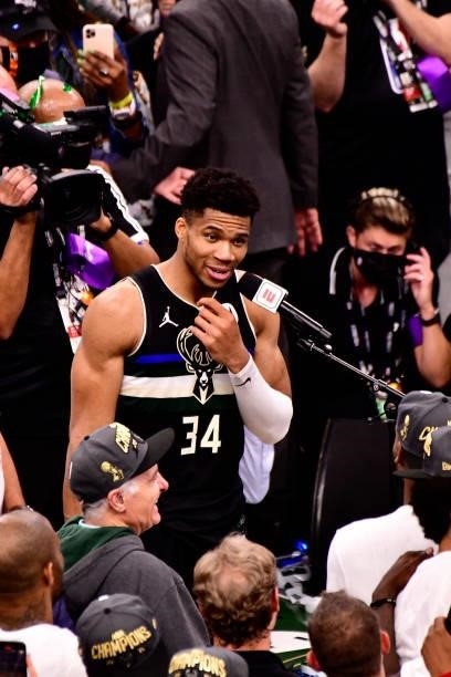 Giannis Antetokounmpo of the Milwaukee Bucks addresses the crowd after defeating the Phoenix Suns in Game Six to win the 2021 NBA Finals on July 20,...