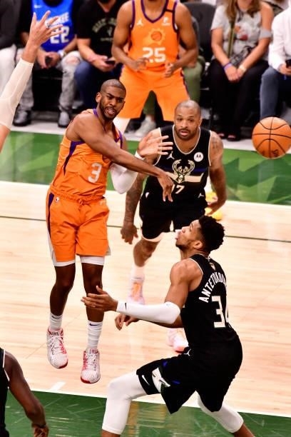 Chris Paul of the Phoenix Suns passes the ball against the Milwaukee Bucks during Game Six of the 2021 NBA Finals on July 20, 2021 at the Fiserv...