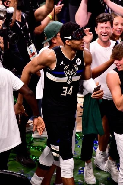 Giannis Antetokounmpo of the Milwaukee Bucks celebrates after defeating the Phoenix Suns in Game Six to win the 2021 NBA Finals on July 20, 2021 at...