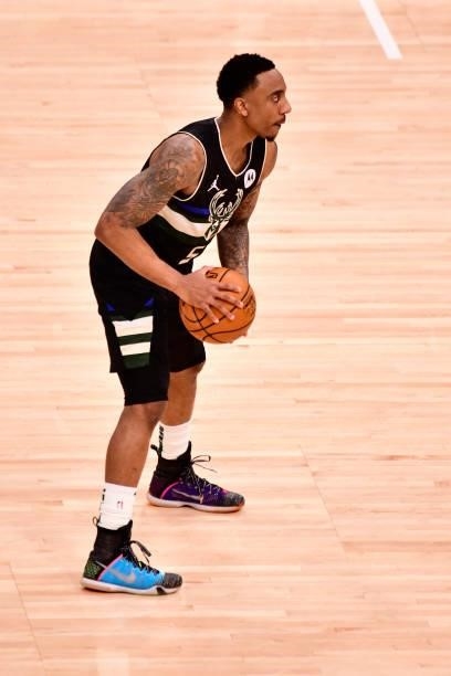 Jeff Teague of the Milwaukee Bucks looks to pass the ball against the Phoenix Suns during Game Six of the 2021 NBA Finals on July 20, 2021 at the...