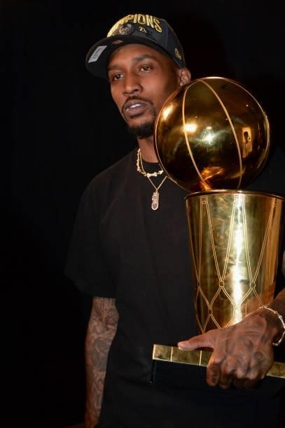 Former NBA Player, Brandon Jennings holds the Larry O'Brien Trophy after the Milwaukee Bucks beat the Phoenix Suns in Game Six to win the 2021 NBA...