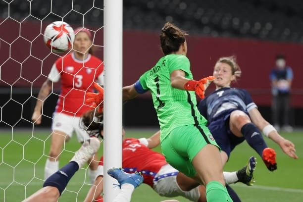 Chile's goalkeeper Christiane Endler concedes the opening goal scored by Britain's forward Ellen White during the Tokyo 2020 Olympic Games women's...
