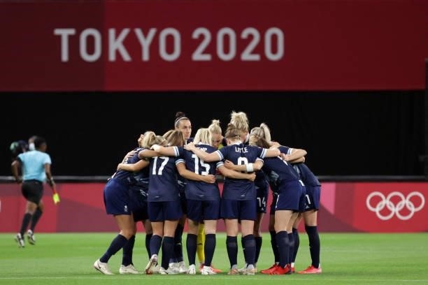 Britain's players gather before the Tokyo 2020 Olympic Games women's group E first round football match between Great Britain and Chile at the...