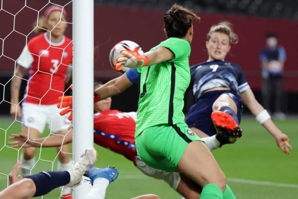 Chile's goalkeeper Christiane Endler concedes the opening goal scored by Britain's forward Ellen White during the Tokyo 2020 Olympic Games women's...