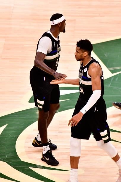 Bobby Portis and Giannis Antetokounmpo of the Milwaukee Bucks high five during the game against the Phoenix Suns during Game Six of the 2021 NBA...