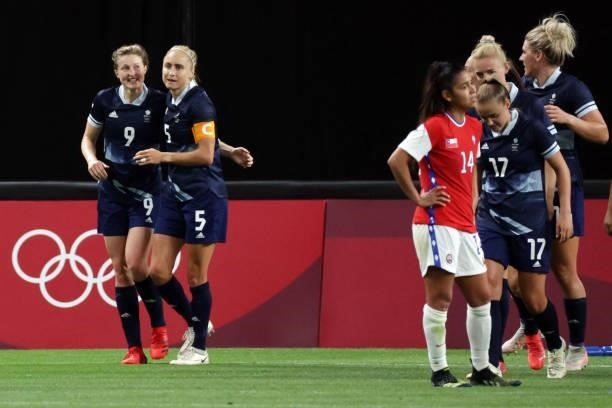 Britain's forward Ellen White celebrates scoring her team's second goal with Britain's defender Steph Houghton during the Tokyo 2020 Olympic Games...