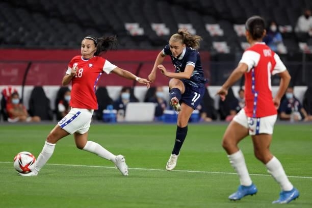 Britain's forward Georgia Stanway shoots past Chile's defender Camila Saez during the Tokyo 2020 Olympic Games women's group E first round football...