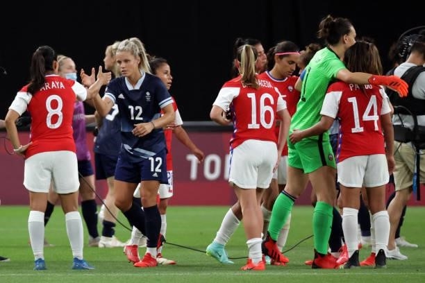 Chile's midfielder Karen Araya congratulates Britain's defender Rachel Daly at the end of the Tokyo 2020 Olympic Games women's group E first round...