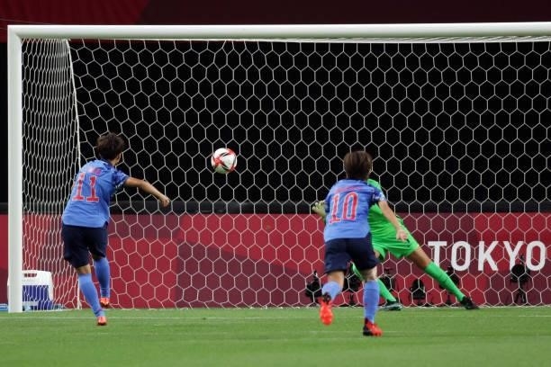Japan's forward Mina Tanaka misses a goal opportunity after shooting a penalty kick during the Tokyo 2020 Olympic Games women's group E first round...