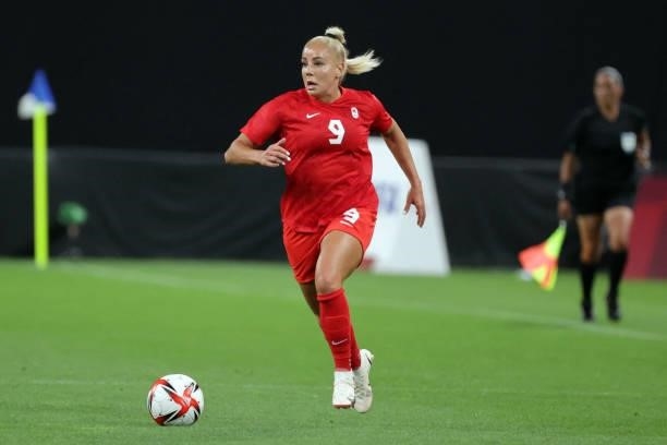 Canada's forward Adriana Leon controls the ball during the Tokyo 2020 Olympic Games women's group E first round football match between Japan and...