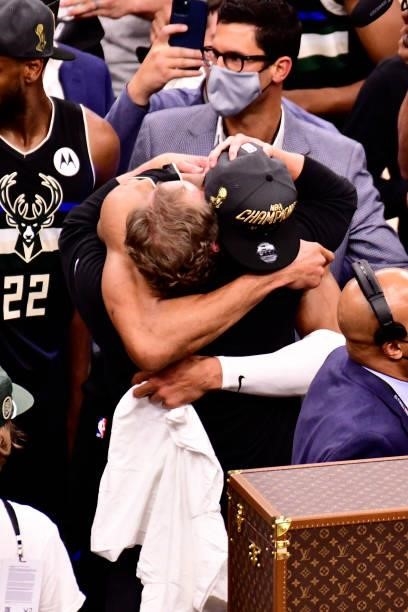 Giannis Antetokounmpo and Head Coach, Mike Budenholzer of the Milwaukee Bucks hug after winning Game Six of the 2021 NBA Finals against the Phoenix...