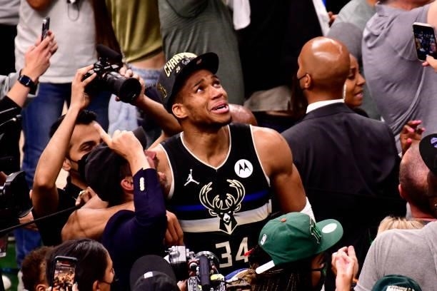 Giannis Antetokounmpo of the Milwaukee Bucks reacts after winning Game Six of the 2021 NBA Finals against the Phoenix Suns on July 20, 2021 at the...