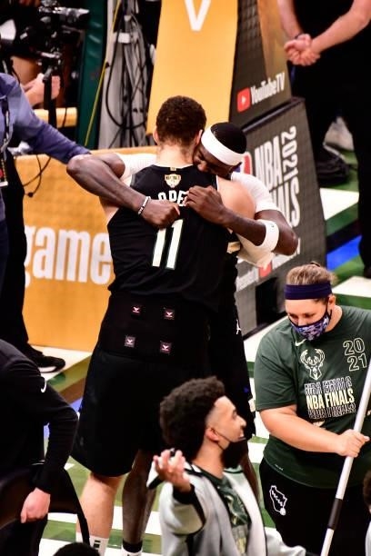 Bobby Portis and Brook Lopez of the Milwaukee Bucks hug after winning Game Six of the 2021 NBA Finals against the Phoenix Suns on July 20, 2021 at...