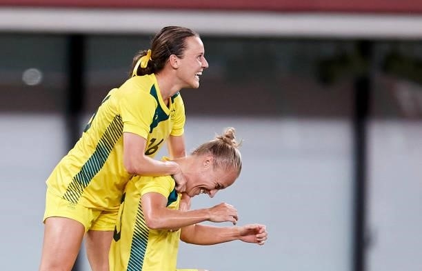 Tameka Yallop of Australia celebrates with Hayley Raso of Australia after scoring her teams first goal in the Women's First Round Group G match...