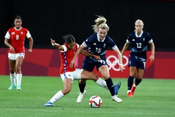 Lauren Hemp of Team Great Britain is challenged by OPAZO Nayadet of Team Chile during the Women's First Round Group E match between Great Britain and...