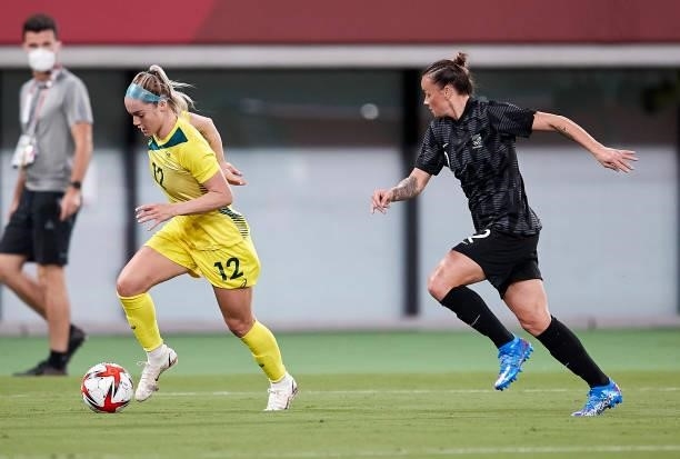 Ellie Carpenter of Australia battle for the ball in the Women's First Round Group G match between Australia and New Zealand during the Tokyo 2020...
