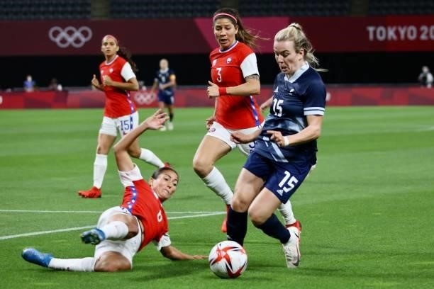 Lauren Hemp of Team Great Britain is challenged by OPAZO Nayadet of Team Chile during the Women's First Round Group E match between Great Britain and...