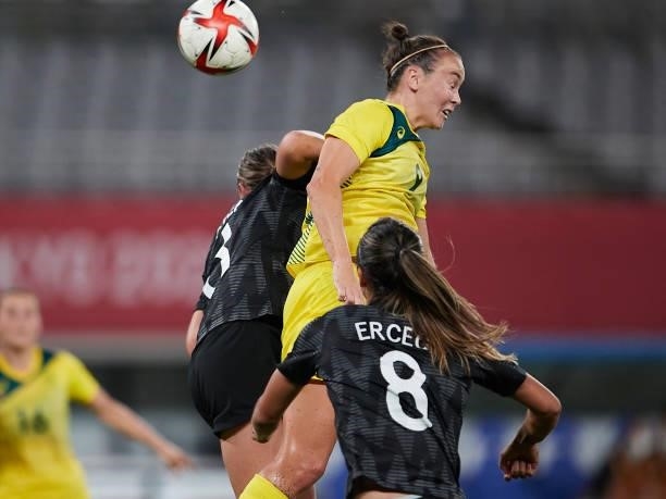 Caitlin Foord of Australia and Anna Green of New Zealand battle for the ball in the Women's First Round Group G match between Australia and New...
