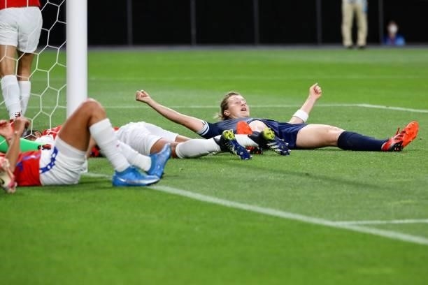 Ellen of Team Great Britain celebrates after scoring their first goal during the Women's First Round Group E match between Great Britain and Chile...