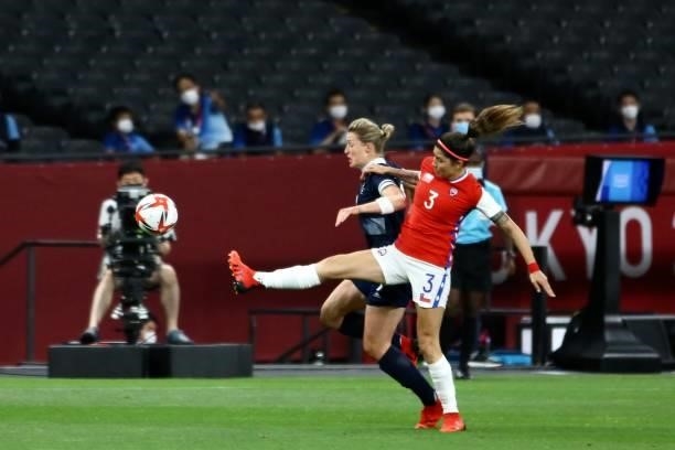 Ellen of Team Great Britain is challenged by GUERRERO Carla of Team Chile during the Women's First Round Group E match between Great Britain and...