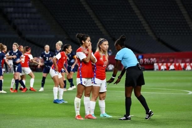 Eferee MUKANSANGA Salima instructed to AEDO Yanara & LOPEZ Yessenia during the Women's First Round Group E match between Great Britain and Chile...