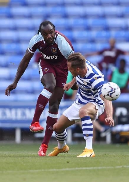 Michail Antonio of West Ham United in action with Michael Morrison of Reading during the pre-season friendly between Reading and West Ham United at...