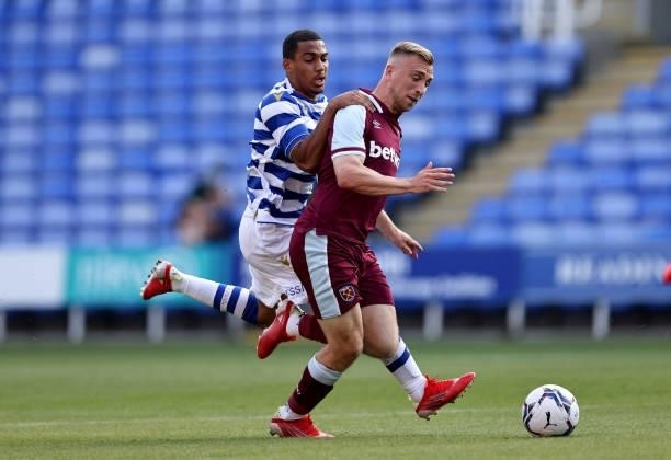 Jarrod Bowen of West Ham United tangles with Andy Rinomhota of Reading during the pre-season friendly between Reading and West Ham United at Madejski...
