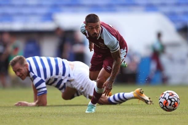Manuel Lanzini of West Ham United in action with Michael Morrison of Reading during the pre-season friendly between Reading and West Ham United at...