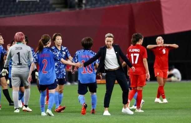 Head Coach PRIESTMAN Bev of Canada team handshake with SHIMIZU Risa of Team Japan after finished the Women's First Round Group E match between Japan...