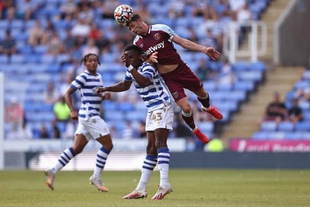 Aaron Cresswell of West Ham United in action with Nelson Abbey of Reading during the pre-season friendly between Reading and West Ham United at...
