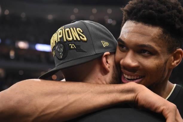 Giannis Antetokounmpo of the Milwaukee Bucks celebrates with Assistant Coach Ben Sullivan after winning Game Six of the 2021 NBA Finals on July 20,...