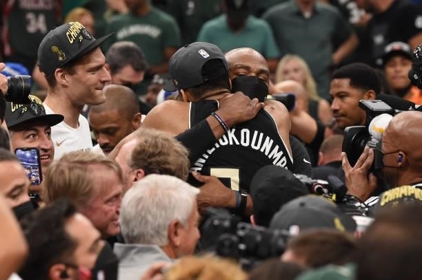 Giannis Antetokounmpo of the Milwaukee Bucks celebrates with Assistant Coach Vin Baker after winning Game Six of the 2021 NBA Finals on July 20, 2021...