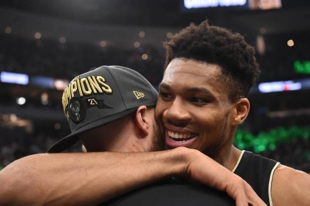 Giannis Antetokounmpo of the Milwaukee Bucks celebrates with Assistant Coach Ben Sullivan after winning Game Six of the 2021 NBA Finals on July 20,...