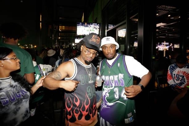 Milwaukee Bucks fans celebrate outside of the Fiserv Forum in the Deer District during Game Six of the 2021 NBA Finals on July 20, 2021 at Fiserv...