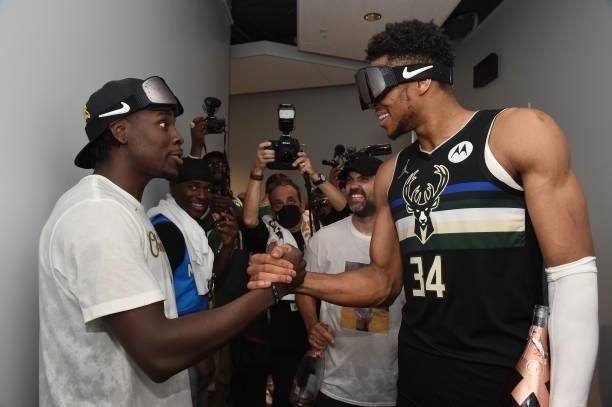 Jrue Holiday and Giannis Antetokounmpo of the Milwaukee Bucks celebrate after winning Game Six of the 2021 NBA Finals on July 20, 2021 at the Fiserv...