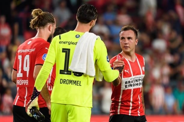 Joel Drommel of PSV Eindhoven and Mario Goetze of PSV Eindhoven celebrate after winning the UEFA Champions League Qualifiers Match between PSV...