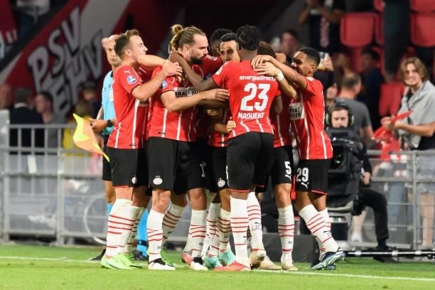 Eran Zahavo of PSV Eindhoven celebrates after scoring his team's fourth goal with teammates during the UEFA Champions League Qualifiers Match between...