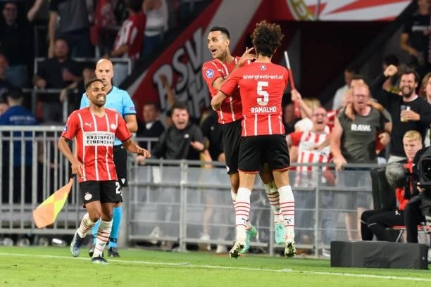 Eran Zahavo of PSV Eindhoven celebrates after scoring his team's fourth goal with teammates during the UEFA Champions League Qualifiers Match between...