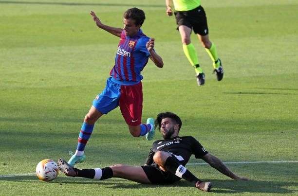 Ricky Puig and Trilles during the friendly match between FC Barcelona and Club Gimnastic de Tarragona, played at the Johan Cruyff Stadium on 21th...