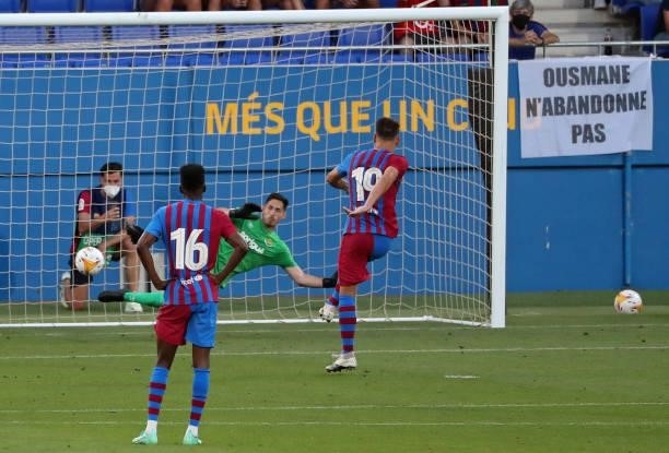 Rey Manaj scores a penalty during the friendly match between FC Barcelona and Club Gimnastic de Tarragona, played at the Johan Cruyff Stadium on 21th...