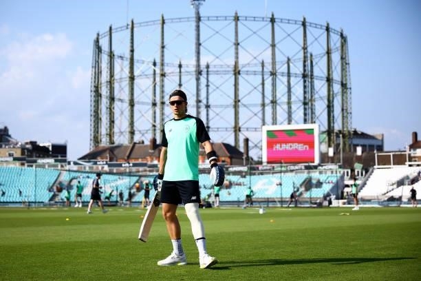 Tom Curran of the Oval Invincibles warms up ahead of The Hundred match between Oval Invincibles Men and Manchester Originals Men at The Kia Oval on...