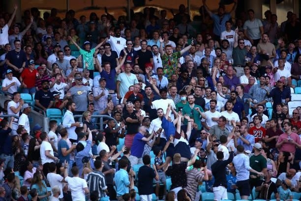 Spectators enjoy the atmosphere during The Hundred match between Oval Invincibles Men and Manchester Originals Men at The Kia Oval on July 22, 2021...